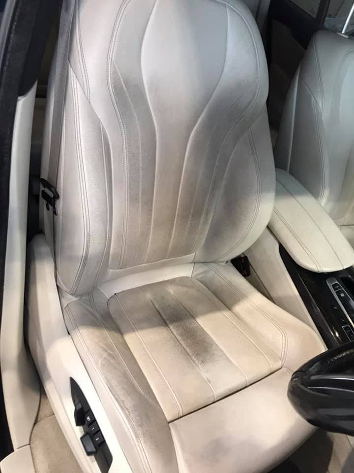 worn-cream-leather-car-interior